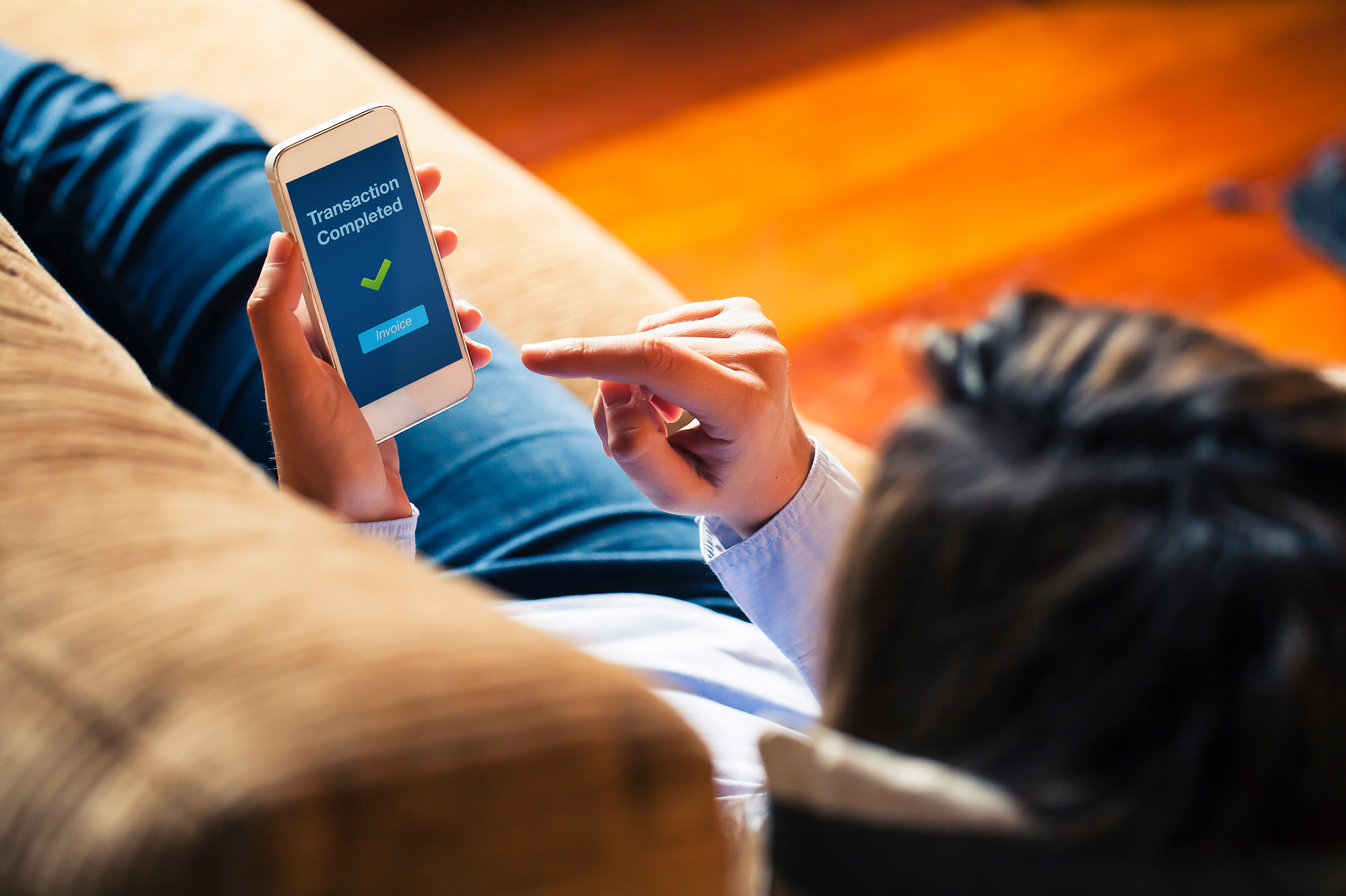 Man doing online banking on his phone