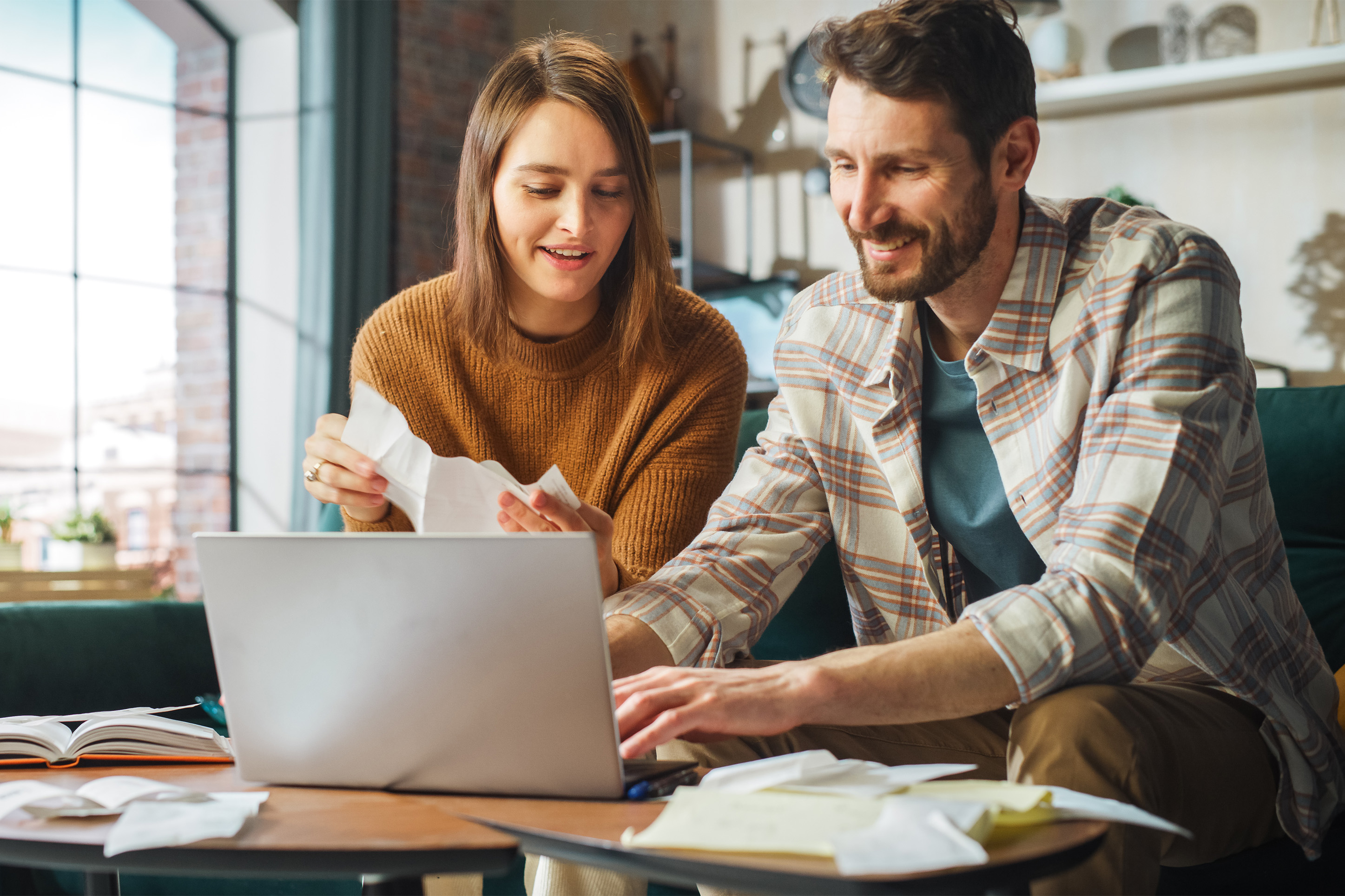 Image of a couple at a computer.