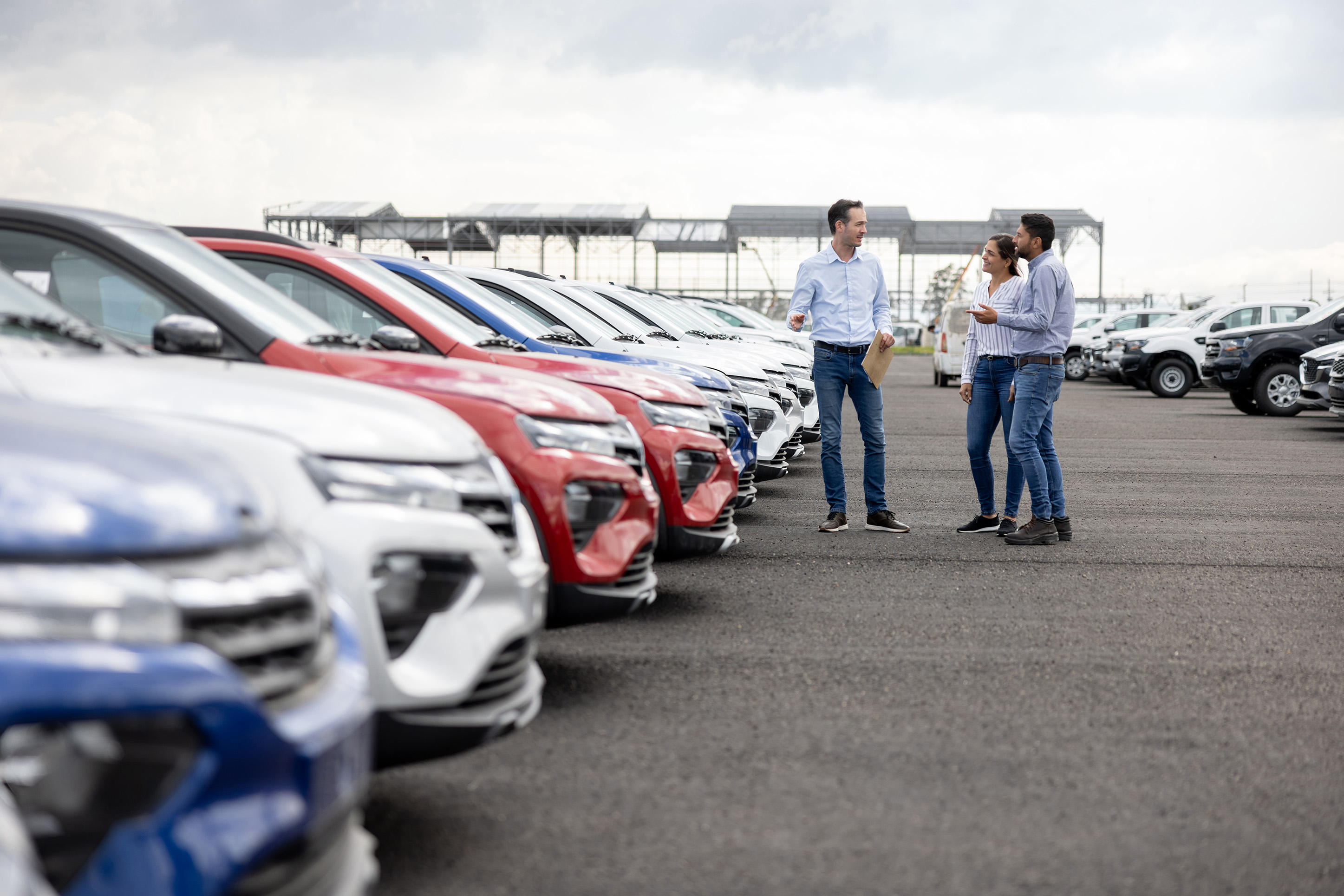 Couple shopping for a new car. 