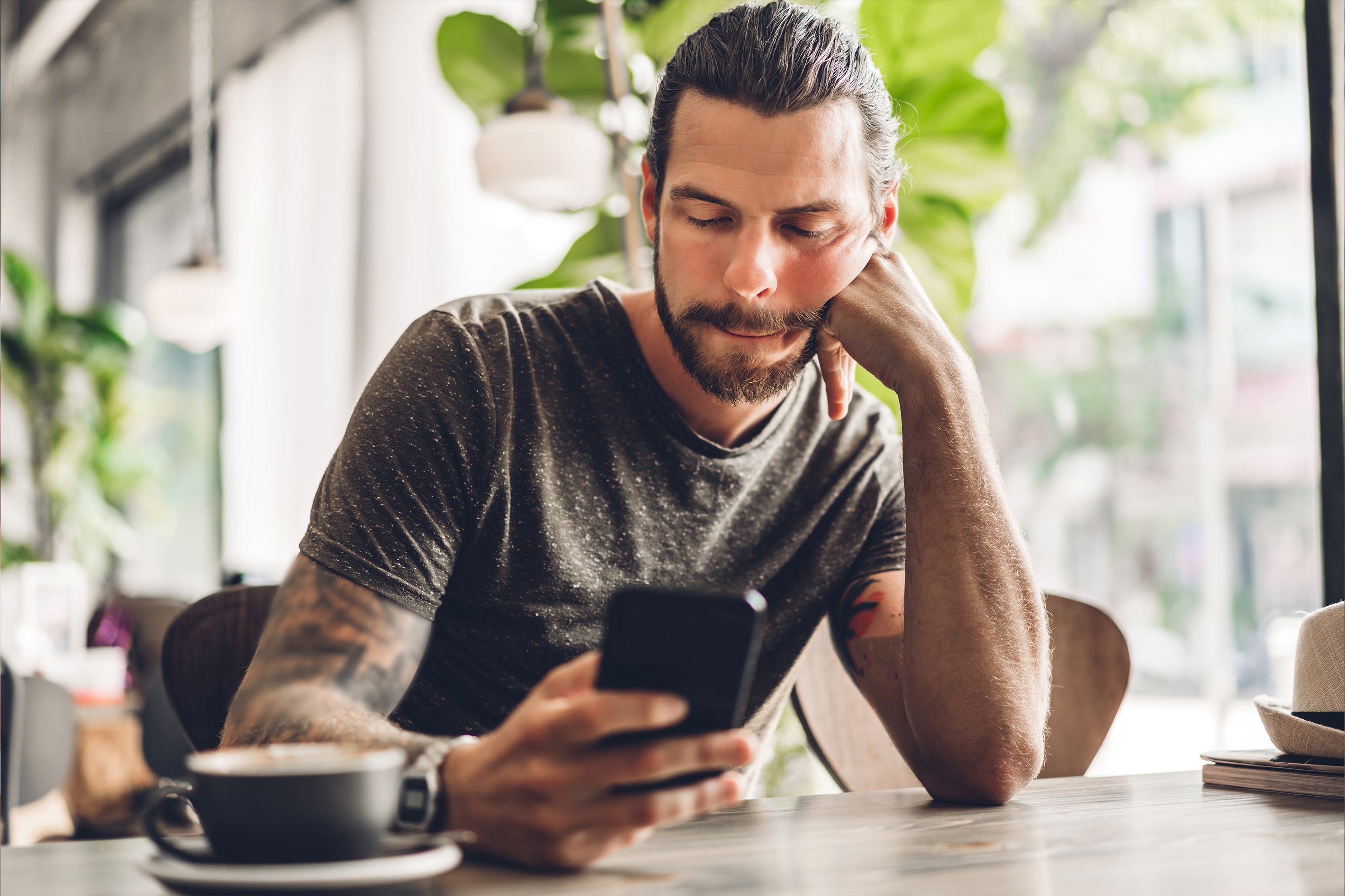 Man getting alerts on his phone