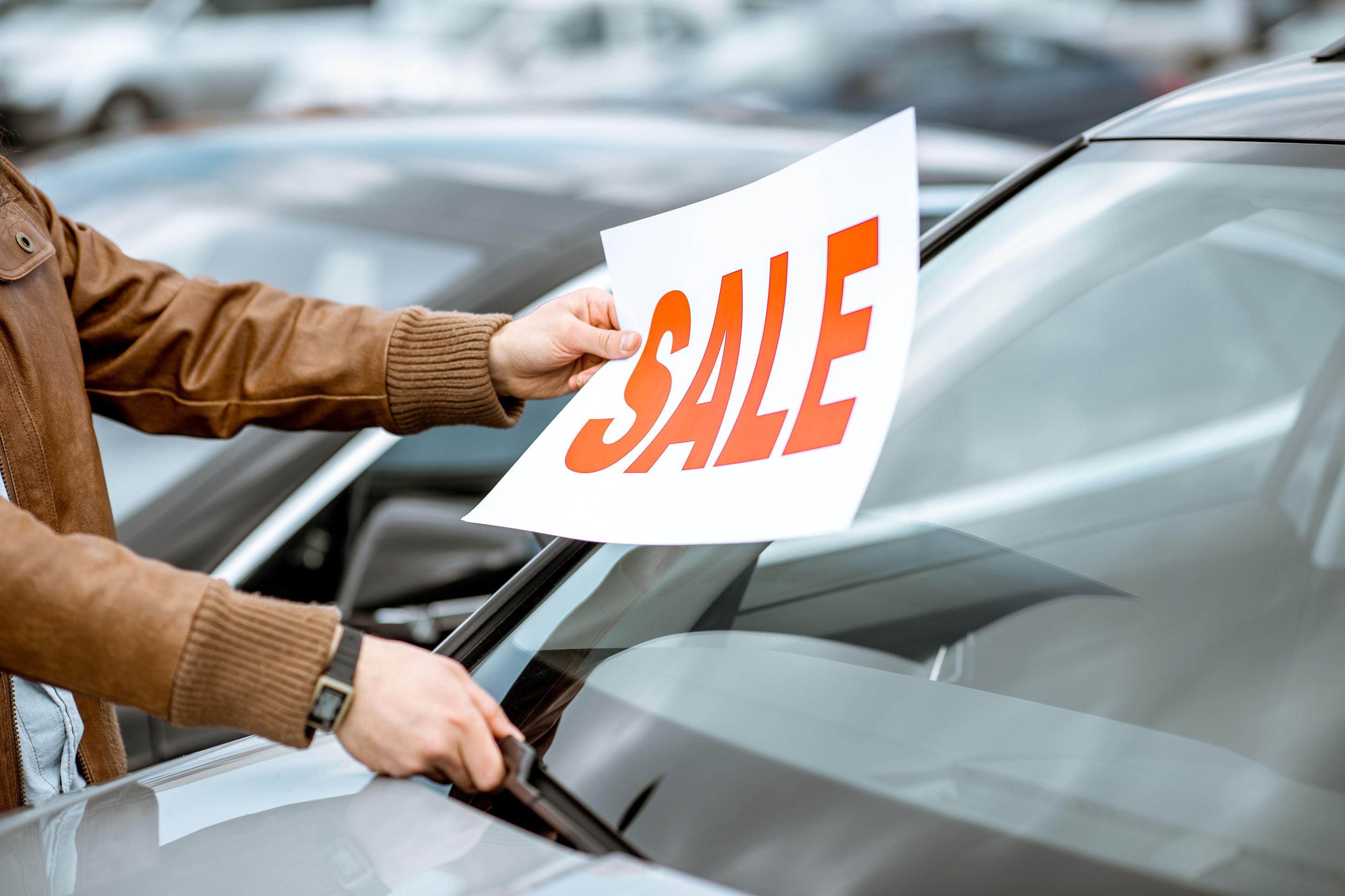 For sale sign on auto.