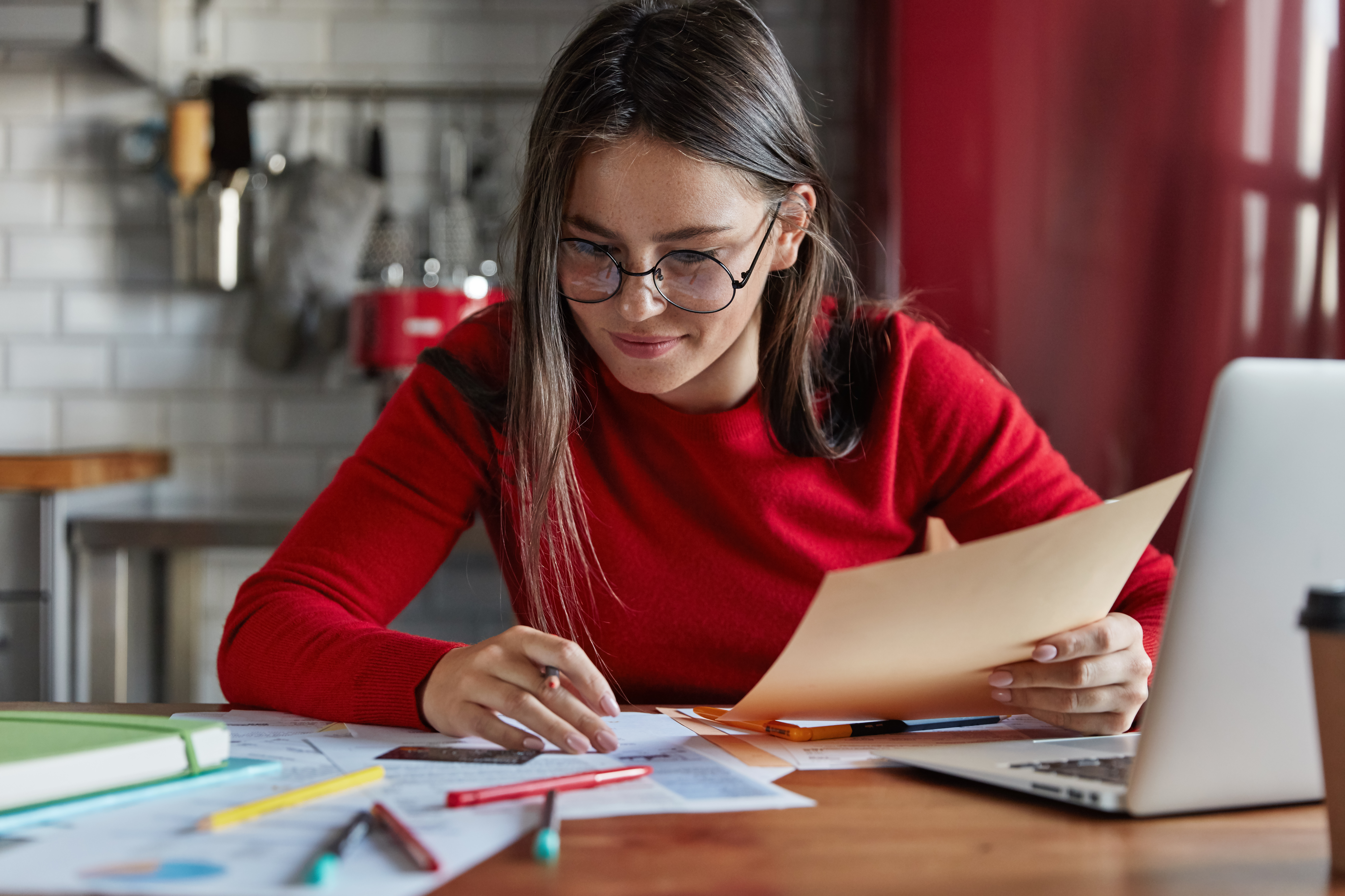 Woman working on her taxes. 