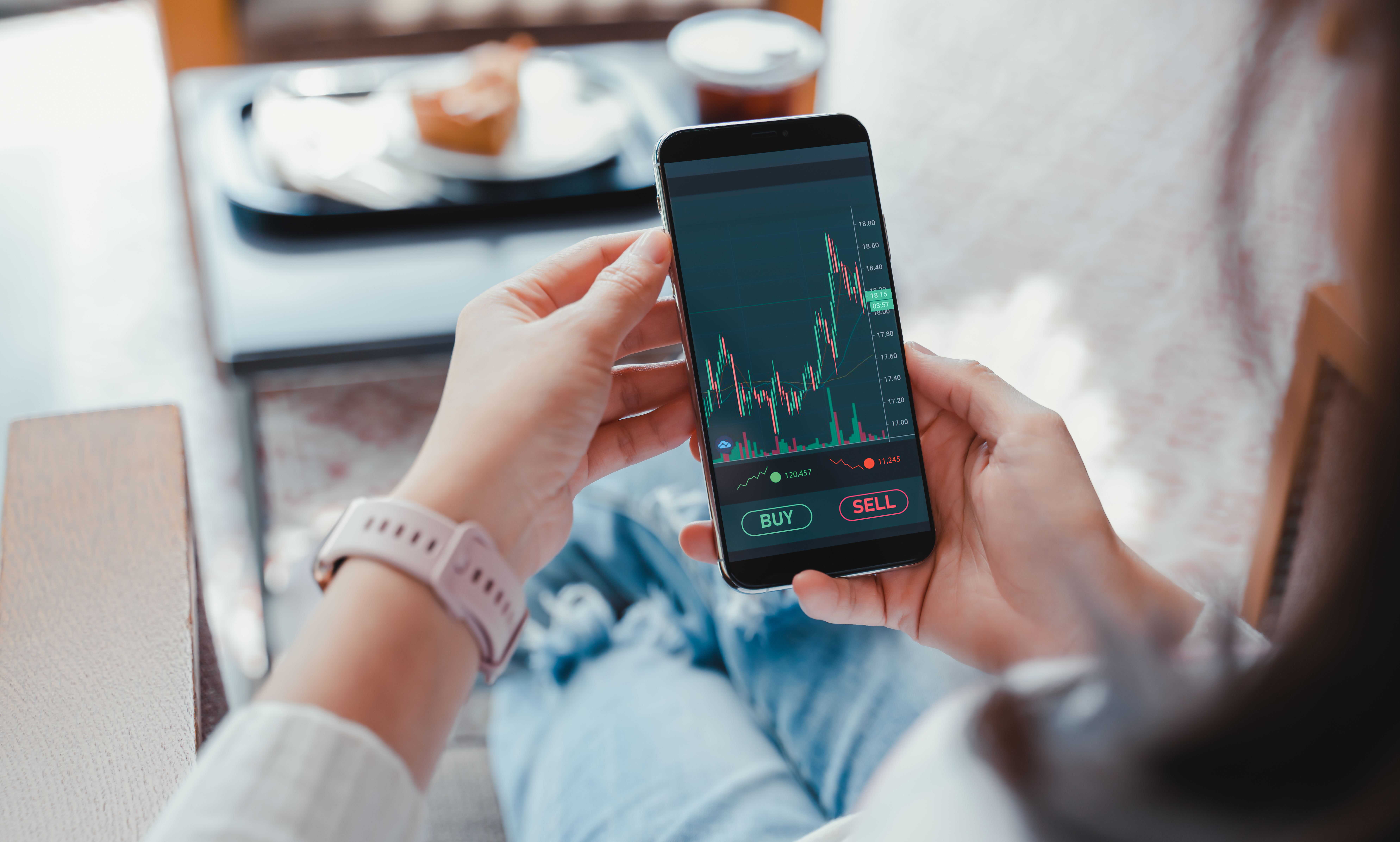woman using investment app to save money for the future