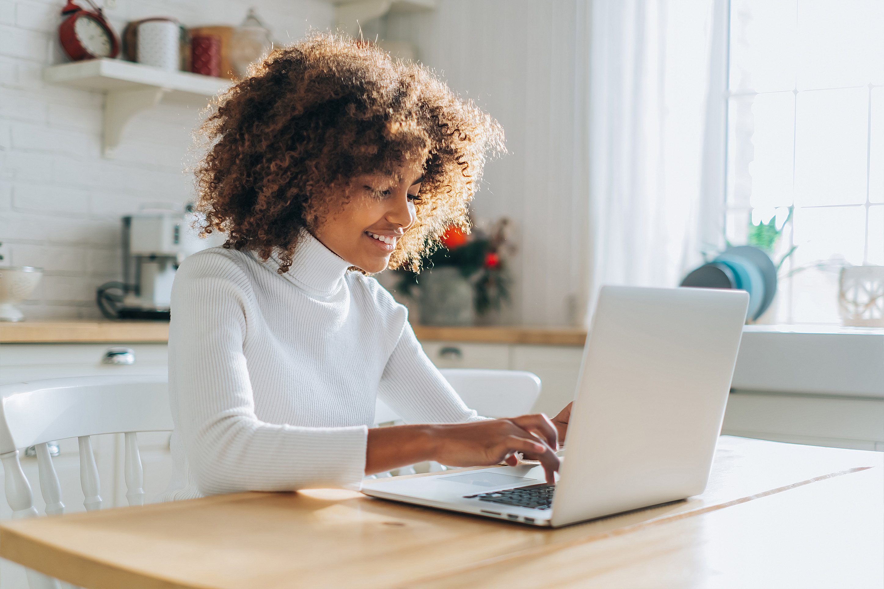 Woman working on her computer. 